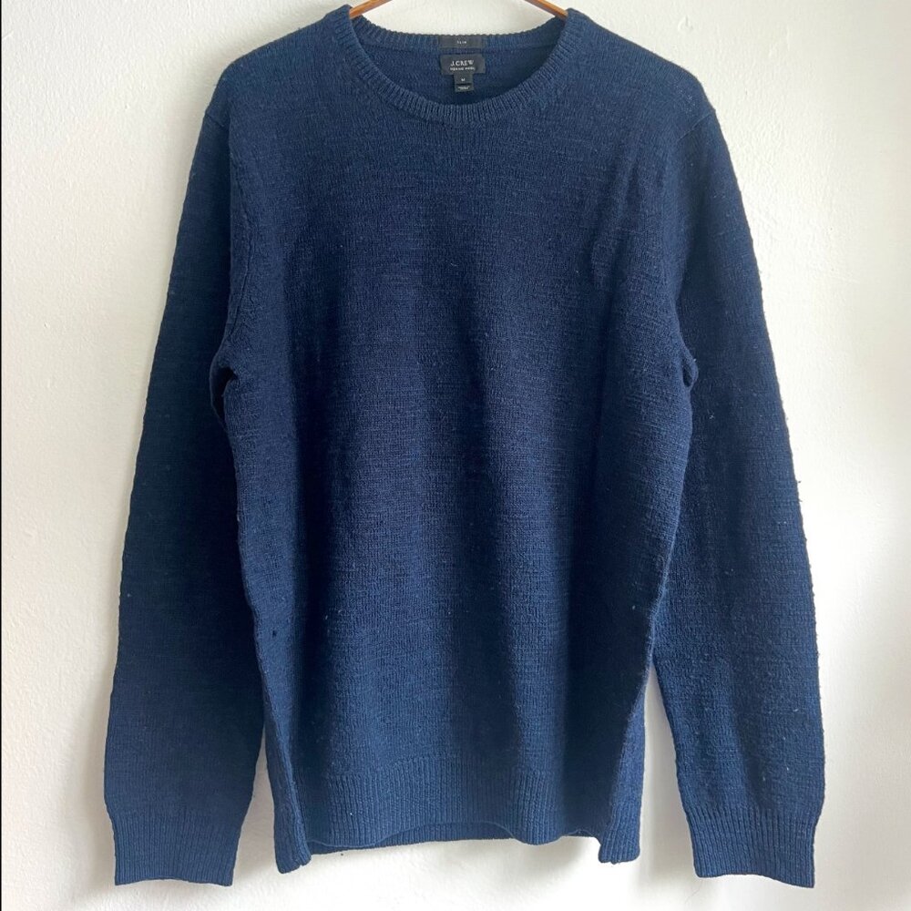 Dark blue J Crew merino wool Men’s medium size sweater with brown elbow pads
